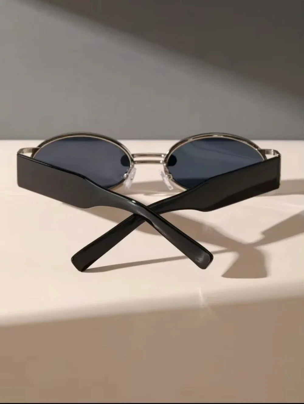 Round Black Sunglasses with Silver Accents